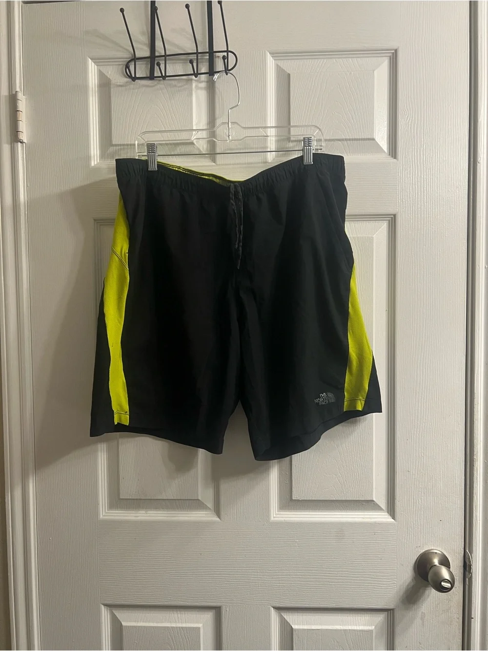 The North Face Men's Black Swim Shorts with Neon Yellow Side Panels